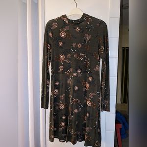 Green and flowered dress